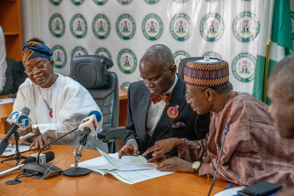 Hon  Minister of Power  Works   Housing  Mr Babatunde Fashola  SAN middle    Permanent Secretary  Works and Housing  Mr Mohammed Bukar right  and  Governor  State of Osun  Mr Isiaka Gboyega Oyetola   left  during a   meeting on State of Osun s infrastructural development   at   the Ministry of Power  Works and Housing Headquarters  Mabushi  Abuja on Monday 17th  December 2018