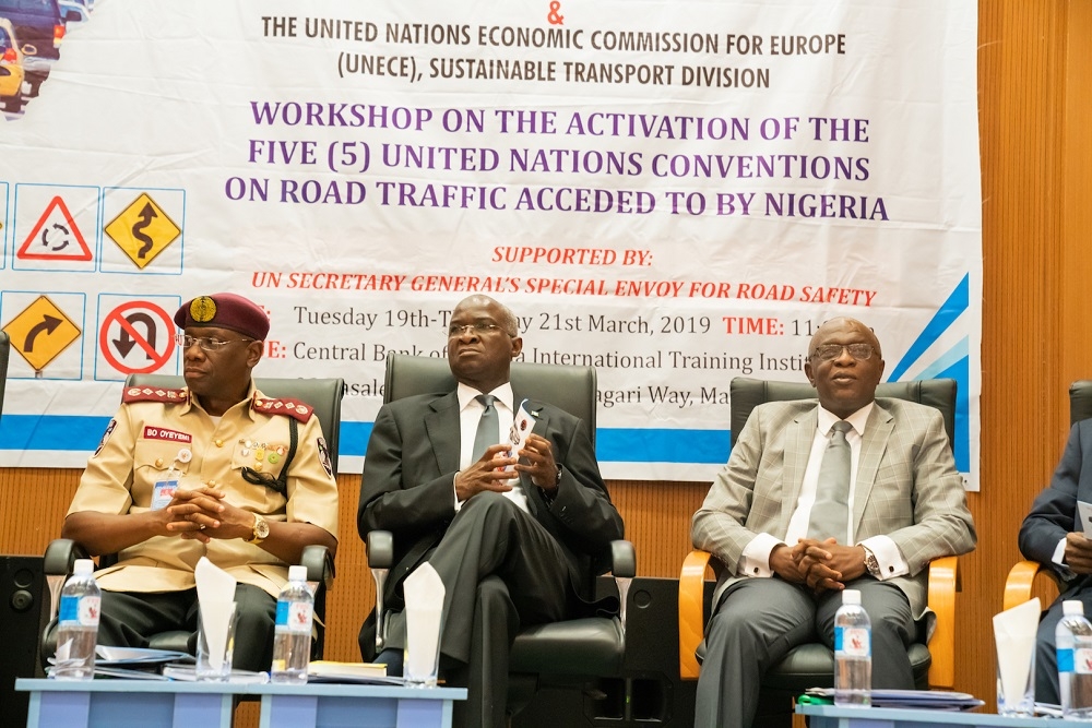 Hon  Minister of Power  Works   Housing  Mr Babatunde Fashola  SAN middle     Corps Marshal of the Federal Road Safety Commission  FRSC  Dr Boboye Oyeyemi  left   and representative of the Secretary to the Government of the Federation   Permanent Secretary in the SGF s Office Mr Olusegun Adekunle  right  during the Workshop on the Activation of the Five  5  United Nations Conventions on Road Traffic Acceded to by Nigeria at the Central Bank of Nigeria International  Training  Institute  02 Lasele Street  Off Shehu Shagari Way  Maitama  Abuja on Tuesday 21st March 2019