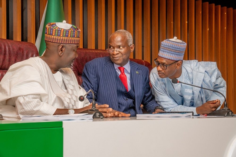 Hon  Minister of Works   Housing  Mr Babatunde Fashola SAN middle   Minister of State in the Ministry  Engr  Aliu Abubakar left  and Permanent Secretary  Works   Housing  Mr  Mohammed Bukar right  during the resumption of duties at the Ministry by   the Ministers after being sworn in at the Presidential Villa in Abuja on  Wednesday  21st August 2019