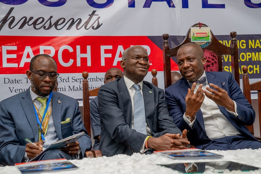 Hon  Minister of Works   Housing  Mr  Babatunde Fashola SAN middle  flanked by Special Adviser to Lagos State Governor on Education and representative of the Lagos State Governor  Mr Tokunbo Wahab  right  and Lagos State University s Vice Chancellor  Prof  Olanrewaju Fagbohun  SAN left   shortly before the Hon  Minister delivered the Keynote Address at   the University s 1st   Research Fair and Endowment of Research Grants Fund with the theme   Driving National Development through Research and Innovation   at the Aderemi Makanjuola Lecture Theatre  LASU  Ojo  Lagos on Tuesday 3rd  September 2019