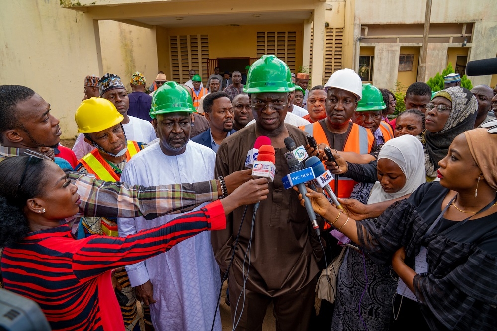 Hon  Minister of Works   Housing  Mr Babatunde Fashola SAN middle  flanked by   the  Minister of State in the Ministry  Engr  Abubakar Aliyu  2nd left    the Director  Engineering Services  Engr  Julius Olurinola  right    and Director  Central Workshops   Equipment  Engr Felix Ebuzoeme  left    while  speaking with   journalists shortly after the inspection of the Federal Ministry of Works   Housing s Engineering Centre comprising the Zonal Workshop   Electrical  Mechanical Training School in Kuje  Abuja on Friday  13th September 2019