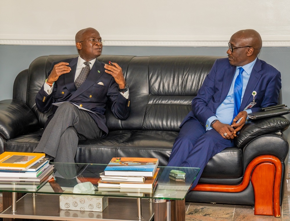 Hon  Minister of Works   Housing  Mr Babatunde Fashola SAN  left  and Group Managing Director  Nigerian National Petroleum Corporation  NNPC   Mr Mele Kolo Kyari  right  during a courtesy visit and meeting to discuss issues relating to improvement of service delivery to citizens at the Minister s Office  Ministry of Works   Housing Headquarters  Mabushi  Abuja on Monday   23rd September 2019