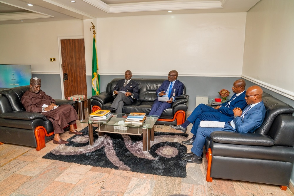 Hon  Minister of Works   Housing  Mr Babatunde Fashola SAN  2nd left   Minister of State in the Ministry  Engr  Abubakar Aliyu  left   Group Managing Director  Nigerian National Petroleum Corporation  NNPC   Mr Mele Kolo Kyari  right  and others during a courtesy visit and meeting to discuss issues relating to improvement of service delivery to citizens at the Minister s Office  Ministry of Works   Housing Headquarters  Mabushi  Abuja on Monday   23rd September 2019