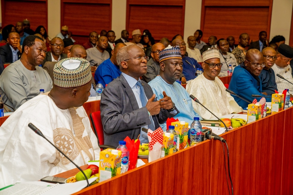 Hon  Minister of Works   Housing  Mr Babatunde Fashola SAN 2nd left   Minister of State in the Ministry  Engr  Abubakar Aliyu  3rd left   Permanent Secretary  Works   Housing  Mr  Mohammed Bukar middle  and others   during the First Interactive Session with the Senate Committee on Works at the Conference Room 231  New Senate Building   National Assembly Complex  Abuja on Thursday  3rd October 2019