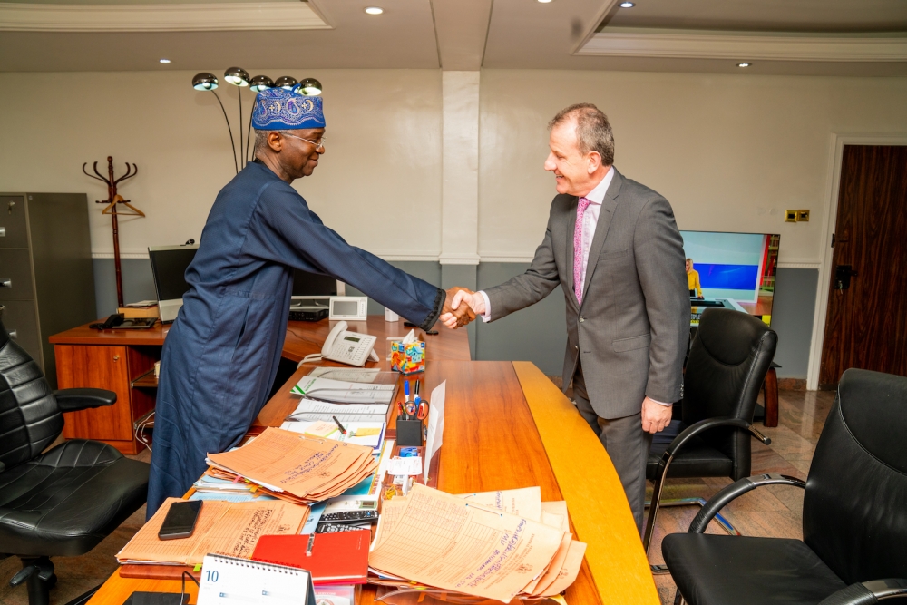 Hon  Minister of Works   Housing  Mr Babatunde Fashola SAN  left  and the Managing Director CEO of TVC Communications  Mr Andrew Hanlon right  during a courtesy visit to the Hon  Minister   s Office at the Ministry of Works   Housing Headquarters  Mabushi  Abuja on Wednesday  9th October 2019