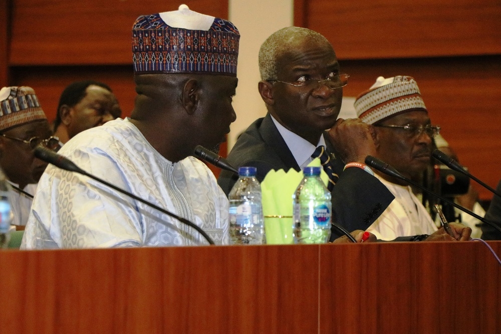 Hon  Minister of Works   Housing  Mr Babatunde Fashola SAN 2nd left   Minister of State in the Ministry  Engr  Abubakar Aliyu  3rd left   Permanent Secretary  Works   Housing  Mr  Mohammed Bukar middle  and others  during the First Interactive Session with the Senate Committee on Works at the Conference Room 231  New Senate Building   National Assembly Complex  Abuja on Thursday  3rd October 2019