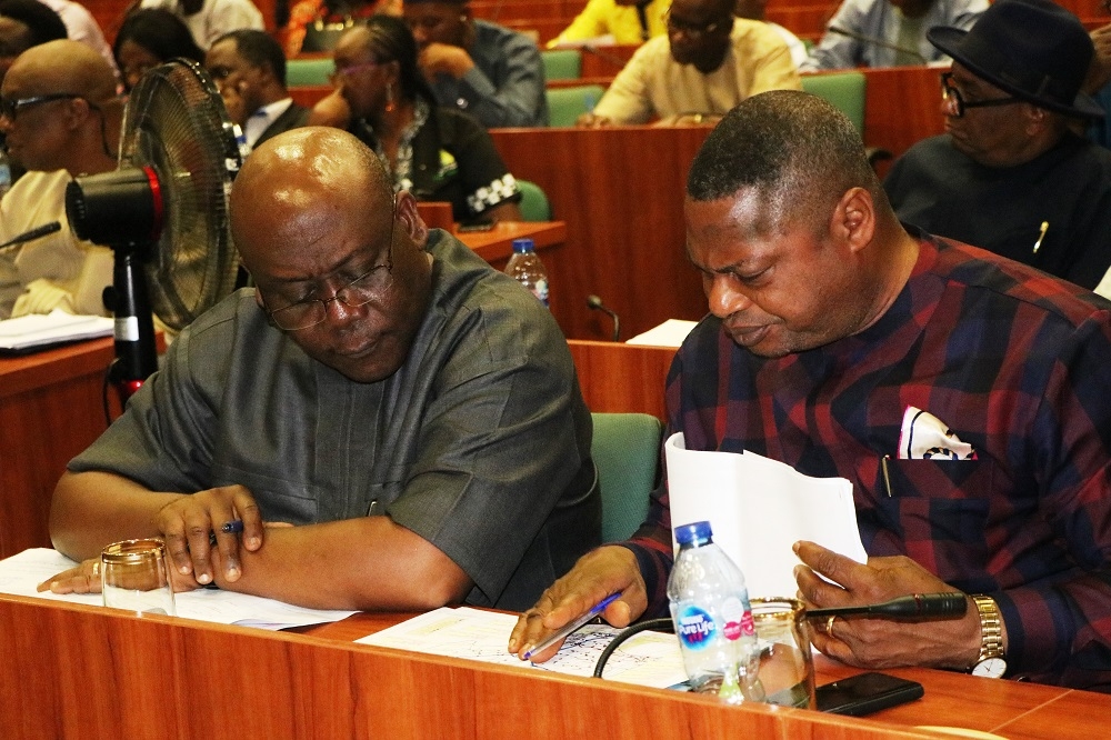 Hon  Minister of Works   Housing  Mr Babatunde Fashola SAN 2nd left   Minister of State in the Ministry  Engr  Abubakar Aliyu  3rd left   Permanent Secretary  Works   Housing  Mr  Mohammed Bukar middle  and others  during the First Interactive Session with the Senate Committee on Works at the Conference Room 231  New Senate Building   National Assembly Complex  Abuja on Thursday  3rd October 2019