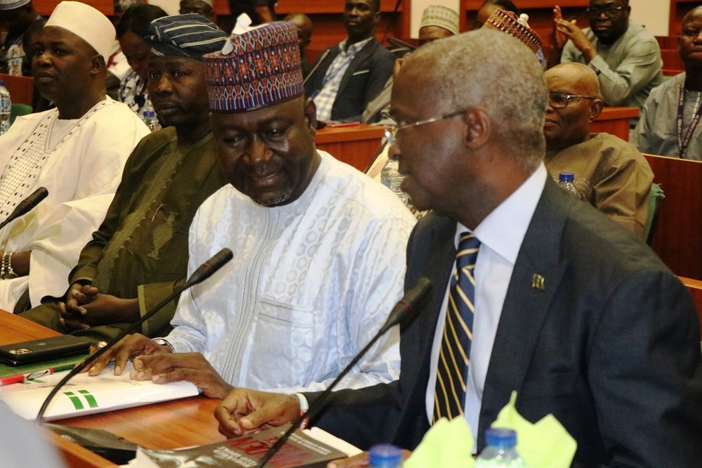 Hon  Minister of Works   Housing  Mr Babatunde Fashola SAN 2nd left   Minister of State in the Ministry  Engr  Abubakar Aliyu  3rd left   Permanent Secretary  Works   Housing  Mr  Mohammed Bukar middle  and others  during the First Interactive Session with the Senate Committee on Works at the Conference Room 231  New Senate Building   National Assembly Complex  Abuja on Thursday  3rd October 2019