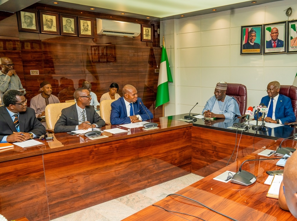 Hon  Minister of Works   Housing  Mr Babatunde Fashola SAN right   Minister of State in the Ministry  Engr  Abubakar Aliyu  2nd right   Representative to ECOWAS and Regional Director  Nigeria Regional Hub  United Nations Industrial Development Organization UNIDO  Mr Jean Bakole middle  and others during a courtesy visit   at the Ministry of Works   Housing  Headquarters on Monday  14th October 2019