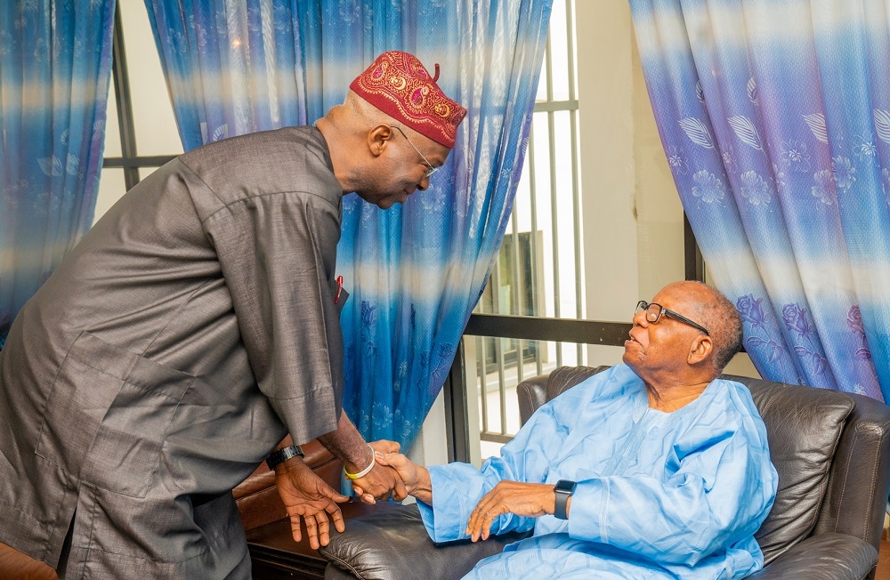 Hon  Minister of Works   Housing  Mr Babatunde Fashola SAN left  and Chief  Dr  Adeniyi Coker right  during the condolence visit of the Hon Minister  to the family of the late first Military Governor of Lagos State  Brig  General Mobolaji Johnson at Ilupeju  Lagos on Saturday  2nd November 2019