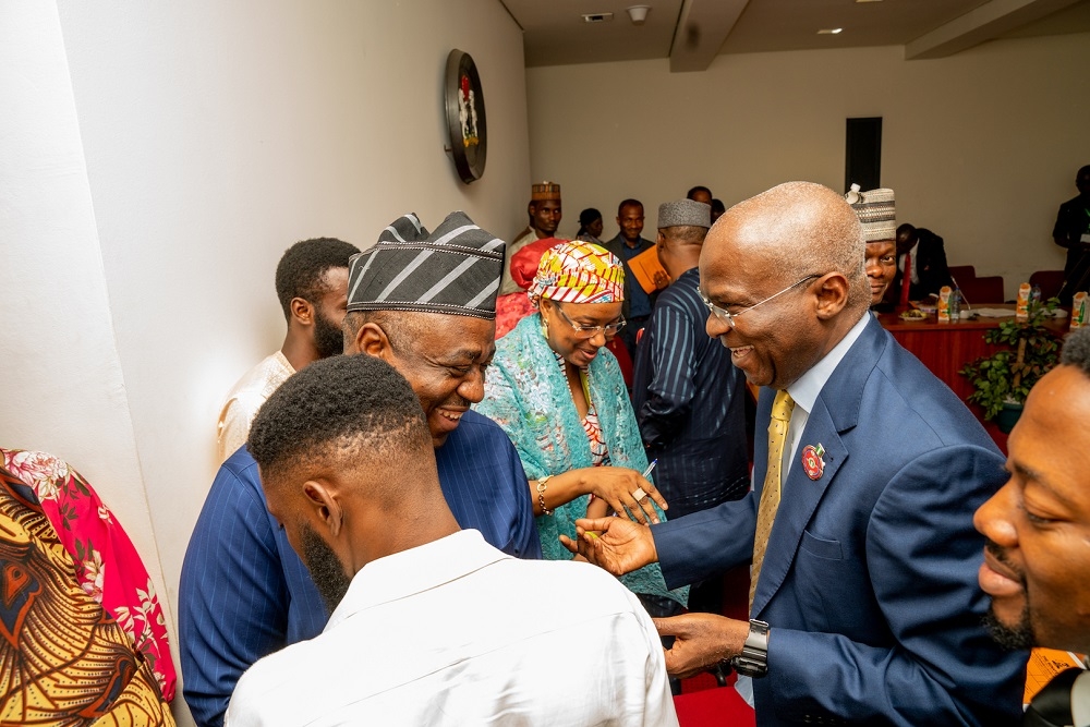 Hon  Minister of Works   Housing  Mr Babatunde Fashola SAN right  interacting with Committee member Senator representing Benue North East  Senator Gabriel Suswam  and others shortly after  the meeting with the Senate Committee on Sustainable Development Goals at the Committee Room 324 Senate Wing  National Assembly Complex  Abuja on Monday  4th November 2019