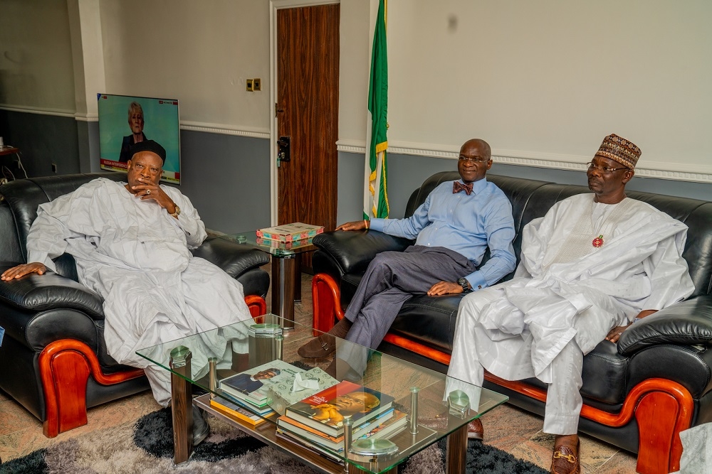 Hon  Minister of Works   Housing  Mr Babatunde Fashola SAN middle   Governor of Nasarawa State  Engr  Abdullahi Sule right  and  Senator representing Nasarawa West Senatorial District  Senator Abdullahi Adamu  during  a courtesy visit and meeting to discuss developmental issues with the Hon Minister by the Governor of Nasarawa State in company with some lawmakers from the State at the Ministry of Works   Housing  Headquarters on Tuesday  5th November 2019