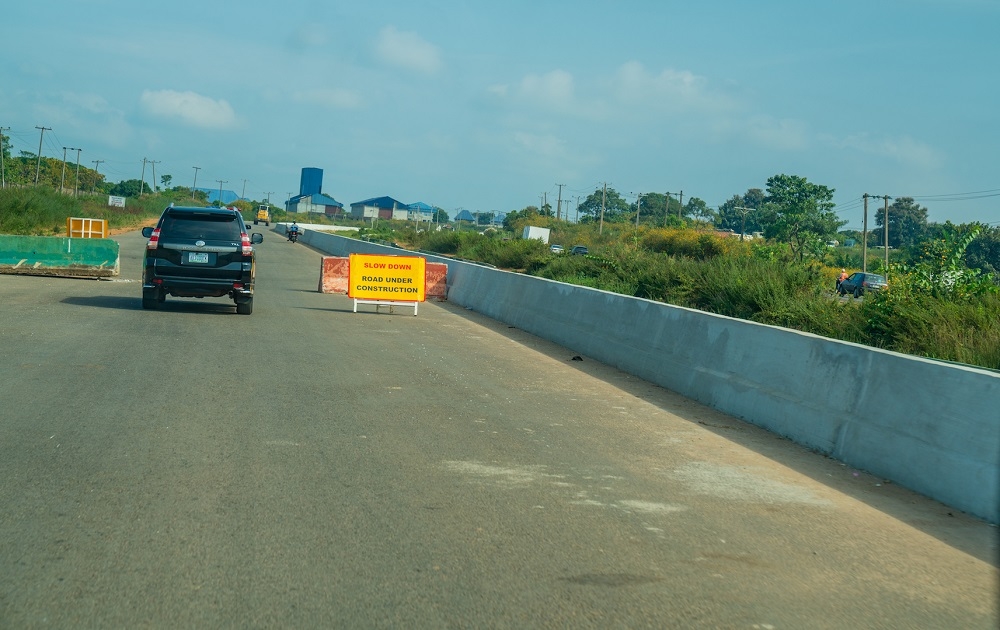 View of the ongoing Reconstruction and Expansion of the   Abuja Kaduna Zaria Kano Road   Section I  Abuja  Kaduna during an inspection tour by  Hon  Minister of Works   Housing  Mr Babatunde Fashola SAN  the  Minister of State in the Ministry  Engr  Abubakar Aliyu  and other    Ministers from   Member Countries of the Trans Sahara Road Liaison Committee  on Tuesday  12th November 2019