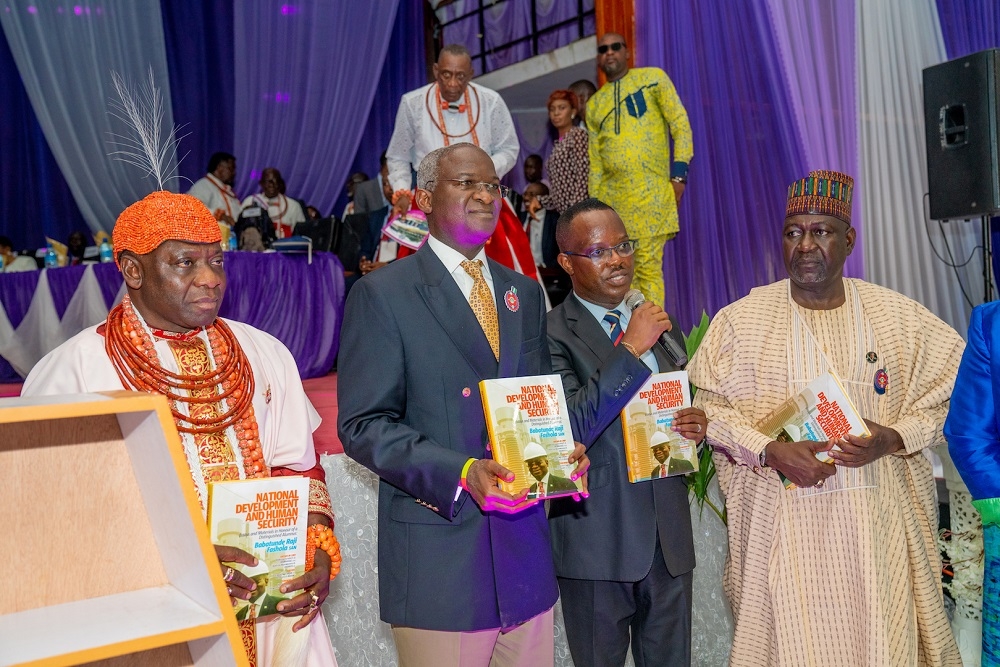 Hon  Minister of Works   Housing  Mr Babatunde Fashola SAN 2nd left   Minister of State in the Ministry  Engr  Abubakar Aliyu right   representative of the Special Guest of Honour and Governor of Edo State  Commissioner of Infrastructure  Engr  Amiolemen Abraham Osahon 2nd right  and the Olu of Warri  Godfrey Emiko left    during the public presentation of a book titled   National Development and Human Security  Essays and Materials in Honour of a Distinguished Alumnus  Babatunde Raji Fashola SAN  at the Akin Deko Main Auditorium  University of Benin  Benin City  Edo State on Thursday  14th November 2019