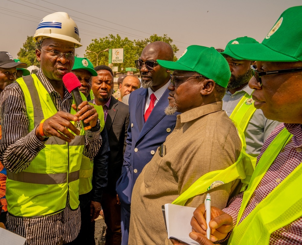 Hon  Minister of Works   Housing  Mr Babatunde Fashola SAN left   Director  Highways  Construction and Rehabilitation  Engr  Yemi Oguntominiyi right   Commissioner for Works   Infrastructure   Niger State  Engr  Ibrahim Muhammad Panti    2nd right  and Chairman  Gurara Local Government Area Council  Hon  Yusuf Waili 2nd left   on   Day One of the Hon  Minister s inspection tour of Highway Projects in Niger State on Monday  27th January 2020