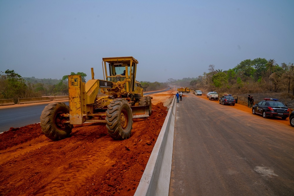 Personnel of Dantata   Sawoe Nigeria Limited   at work during the inspection of ongoing   Dualization of Lokoja     Benin Road  Obajana Junction     Benin  Section Ill  Phase l  Auchi   Ehor  Edo State  by the  Hon  Minister of Works   Housing  Mr Babatunde Fashola SAN  as part of the tour of Federal Government  Highway and Housing Projects  in the South South on Monday  10th February 2020