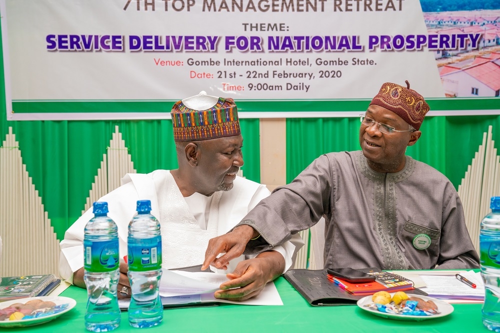 Hon  Minister of Works   Housing  Mr Babatunde Fashola SAN  right  and   Minister of State in the Ministry  Engr  Abubakar Aliyu  left  on Day One of  the 7th  Edition of the Retreat for Heads of Departments and Chief Executive Officers of Agencies of the Federal Ministry of Works and Housing  with the theme   Service Delivery for National Prosperity    at the Gombe International Hotel  Gombe State on Friday  21st February 2020