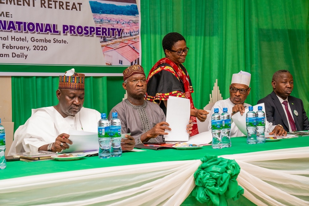 Hon  Minister of Works and Housing  Mr Babatunde Fashola SAN  2nd left   Minister of State in the Ministry  Engr  Abubakar Aliyu  left   Permanent Secretary  Works and Housing  Mr Mohammed  Bukar   2nd right   Acting Surveyor General of the Federation OSGoF   Surveyor Taiwo Adeniran   left  and Director  Human Resources  Mrs Isang Iwara   on Day One of    the 7th  Edition of the Retreat for Heads of Departments and Chief Executive Officers of Agencies of the Federal Ministry of Works and Housing  with the theme   Service Delivery for National Prosperity    at the Gombe International Hotel  Gombe State on Friday  21st February 2020