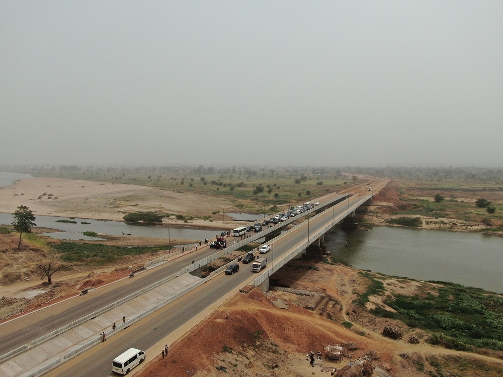 Aerial view of the 2 2Kilometre Loko   Oweto Bridge  over River Benue linking Loko and Oweto in Nasarawa and Benue States during an inspection tour by the  Hon  Minister of Works and Housing  Mr Babatunde Fashola SAN and the Minister of State  Engr  Abubakar Aliyu  on Friday  13th March 2020