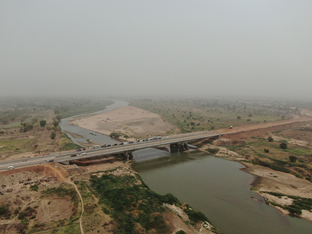 Aerial view of the 2 2Kilometre Loko   Oweto Bridge  over River Benue linking Loko and Oweto in Nasarawa and Benue States during an inspection tour by the  Hon  Minister of Works and Housing  Mr Babatunde Fashola SAN and the Minister of State  Engr  Abubakar Aliyu  on Friday  13th March 2020