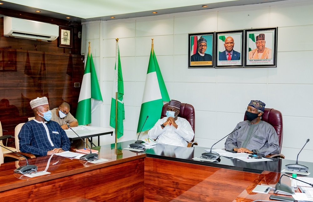 Hon  Minister of Works and Housing  Mr Babatunde Fashola SAN right   Minister of State in the Ministry  Engr  Abubakar Aliyu middle  and   President  Trade Union Congress of Nigeria  TUC   Mr Quadri Olaleye left    during a courtesy visit by the leadership of the Trade Union Congress of Nigeria to the Minister at the Ministry of Works and Housing Headquarters  Mabushi  Abuja on Friday  10th July 2020