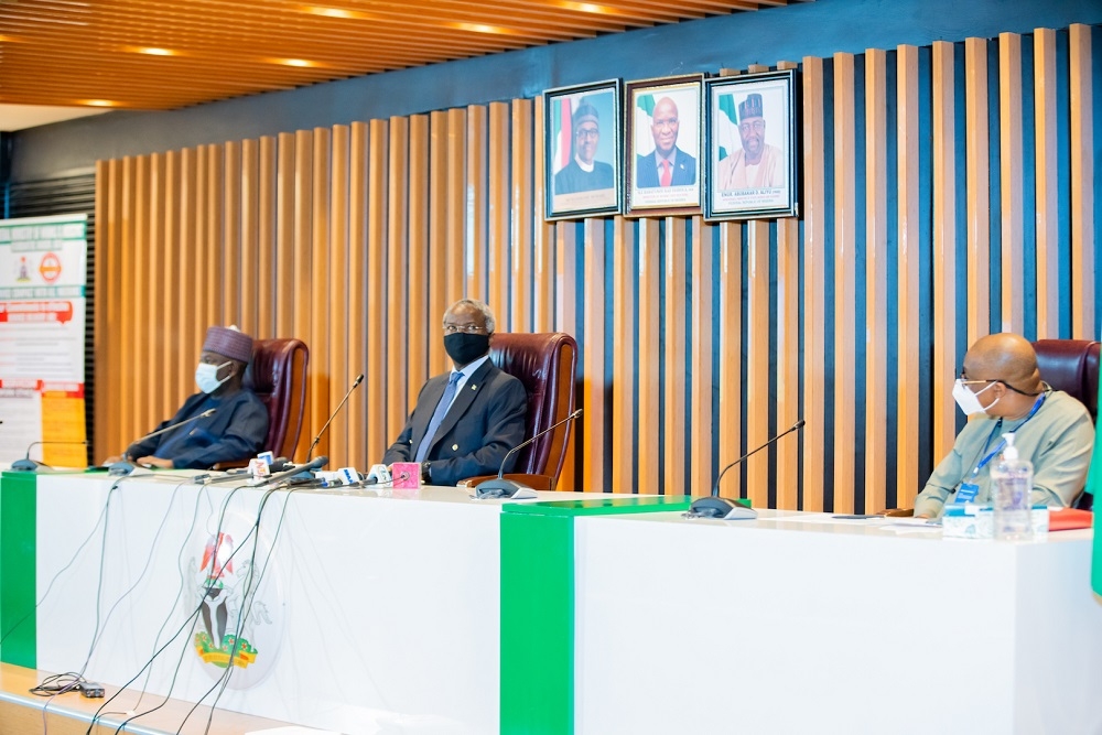 Hon  Minister of Works and Housing  Mr Babatunde Fashola SAN right   Minister of State in the Ministry  Engr  Abubakar Aliyu left  and Acting Permanent Secretary  Ministry of Works and Housing  Engr  Yemi Oguntominiyi right  during a Press Briefing on the Partial Closure for Repairs and Restoration of the Third Mainland Bridge in Lagos at the Ministry of Works and Housing Headquarters  Mabushi  Abuja on Tuesday  21st July 2020