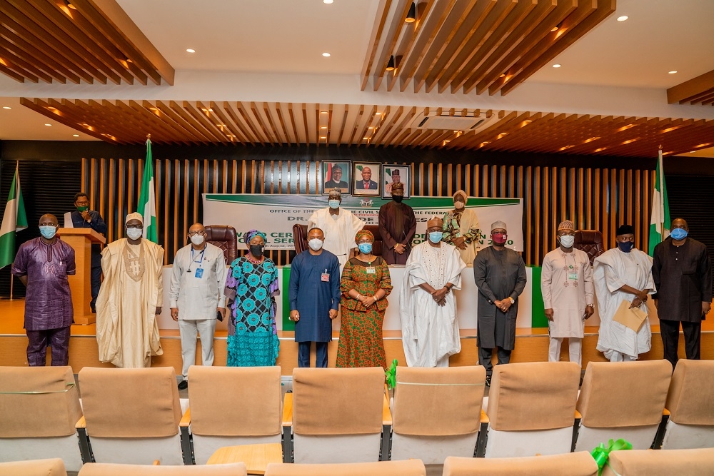 Hon. Minister of Works and Housing, Mr Babatunde Fashola, SAN(middle),Â Minister of State in the Ministry, Engr. Abubakar Aliyu(left), Head of the Civil Service of the Federation, Dr. Folashade Yemi â€“ Esan(right) and some permanent secretaries Â in a group photographs shortly after the Award Ceremony of the Maiden Edition of the Federal Civil Service Innovation Competition 2020-Â organized by the Office of the Head of the Civil Service of the Federation at the Ministry of Works and Housing Conference Hall, Mabushi, Abuja on Friday,7th August 2020