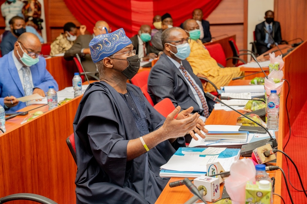 Hon. Minister of Works and Housing, Mr Babatunde Fashola,SAN (left) and Permanent Secretary, Mr Ernest Afolabi Umakhihe (right) during a Session of the Year 2021 Budget Defence hosted by the Senate Committee on Works at the New Senate Building, National Assembly Complex, Abuja on Wednesday , 21st Â October 2020