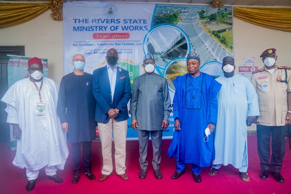 Hon. Minister of Works and Housing, Mr Babatunde Fashola,SAN(3rd left) and Governor of Rivers State, Nyesom Ezenwo Wike (middle), Chairman, Senate Committee on Works, Senator Adamu Aliero (3rd right), Chairman, House Committee on Works, Hon. Abubakar Kabir Abubakar(2nd right), Director â€“ General Budget office of the Federation, Mr Ben Akabueze (2nd left) and others in a group photograph shortly after the 26th Meeting of the National Council on Works, with the theme,â€ Road Infrastructure Development, Job Creation and National Economic Growthâ€ at the Hotel Presidential Aba Road, Port Harcourt, Rivers State on Thursday, 10th December 2020