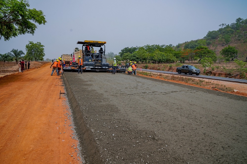 Personnel of China Harbour Engineering Company Ltd (CHEC) at work  during the inspection of the ongoing construction work on the expansion of 5.4km Abuja - Keffi Expressway and Dualization of Keffi - Akwanga - Lafia - Makurdi Road spanning the FCT, Nasarawa and Benue States during an inspection tour by the Hon. Minister of Works and Housing, Mr Babatunde Fashola,SAN and the Hon. Minister of State in the Ministry, Engr. Abubakar Aliyu  on Tuesday, 30th March 2021