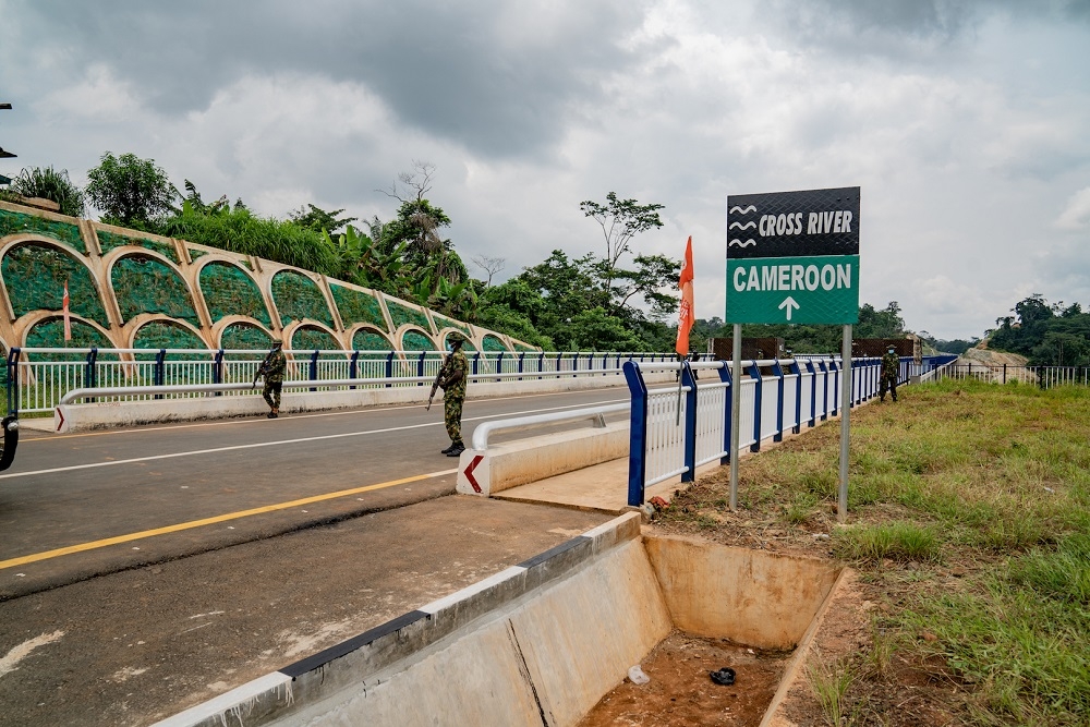 A view of the Nigeria approach road with slope protection works and the New Nigeria/Cameroon Joint Border Bridge at Mfum/Ekok in Cross River State during an inspection tour by the Hon. Minister of Works and Housing, Mr. Babatunde Fashola, SAN on Monday 26th July 2021.