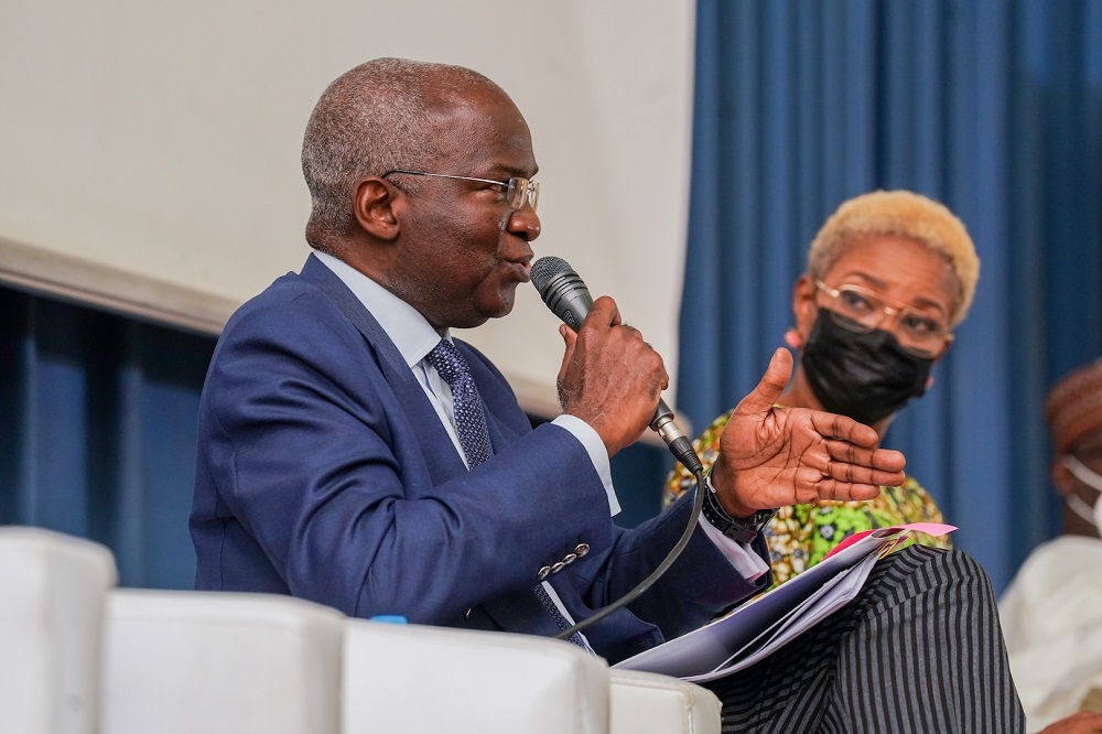 Hon. Minister of Works and Housing, Mr. Babatunde Fashola, SAN(left) with Media Entrepreneur and one of the Moderators of the event, Mrs Adesuwa Onyenokwe during the Special TownHall Meeting with the theme,&#039;&#039; Nigeria Infrastructure Revolution: Road to a New Future&quot;,  organized by the Business Hallmark Public Policy Forum at the Shehu Musa Yar&#039;Adua Centre, Abuja on Thursday, 29th July 2021. 