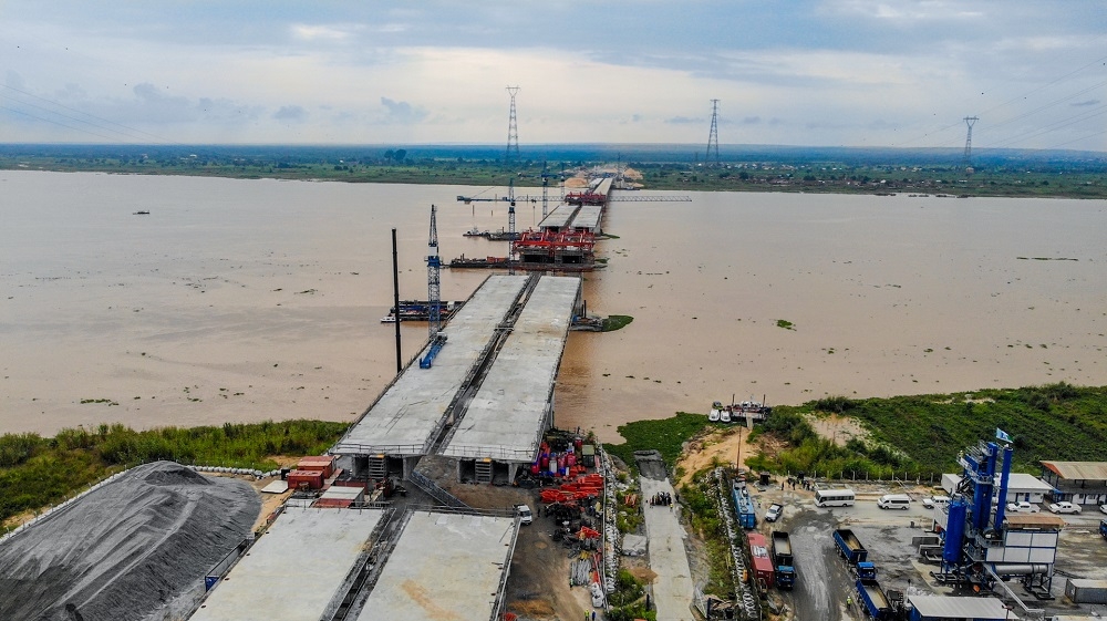 A view of the 2nd Niger bridge showing the almost completed incremental launching of the deck during an inspection of the ongoing construction of Main Works and Associated Infrastructure of the 2nd Niger Bridge in Delta and Anambra States by the Hon. Minister of Works and Housing, Mr. Babatunde Fashola, SAN on Tuesday, 10th August 2021