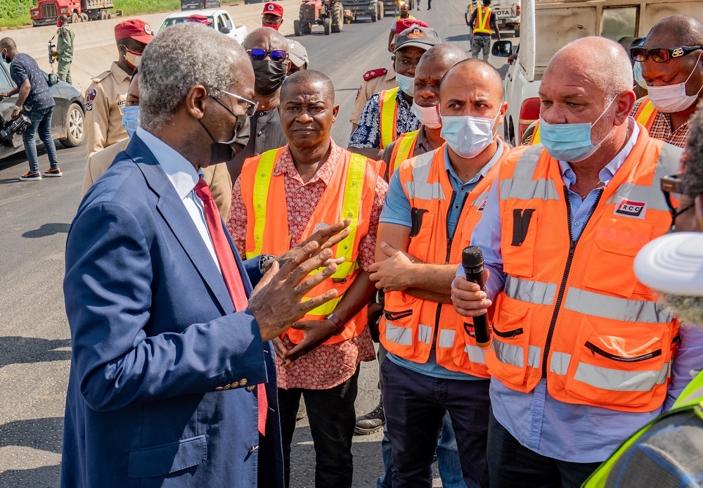 Hon. Minister of Works and Housing, Mr Babatunde Fashola, SAN (left), interacts with the Project Manager, RCC, Engr. Victor Dratch (right) and others the  inspection  of the ongoing Reconstruction, Rehabilitation and Expansion of the Lagos -Ibadan Expressway (Section II: Shagamu Interchange - Ibadan) at the former Toll Gate Ibadan on Wednesday, 15th September 2021. 