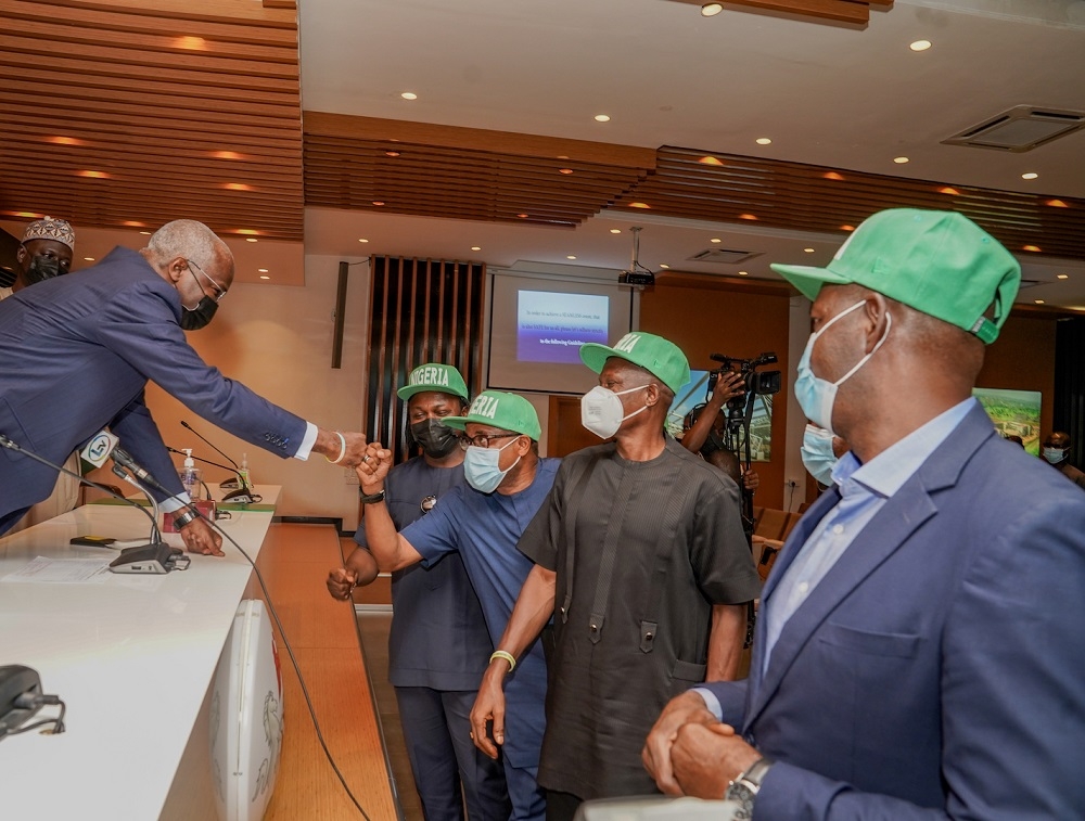 Hon. Minister of Works and Housing, Mr Babatunde Fashola,SAN (left), interacting with some members of the 1994 Super Eagles Team that won the African Nations Cup in Tunisia, tagged Tunisia &#039;94 in the front row right to left - Mr Augustine Eguavoen, Mr Alloy Agu, representative of Mr Benedict Iroha, Mr Obinna and Mr Victor Ikpeba shortly after a courtesy visit by the 1994 Super Eagles Team led by the then Captain, Mr Augustine Eguavoen  at the Ministry of Works and Housing, Headquarters, Mabushi, Abuja on 30th September 2021