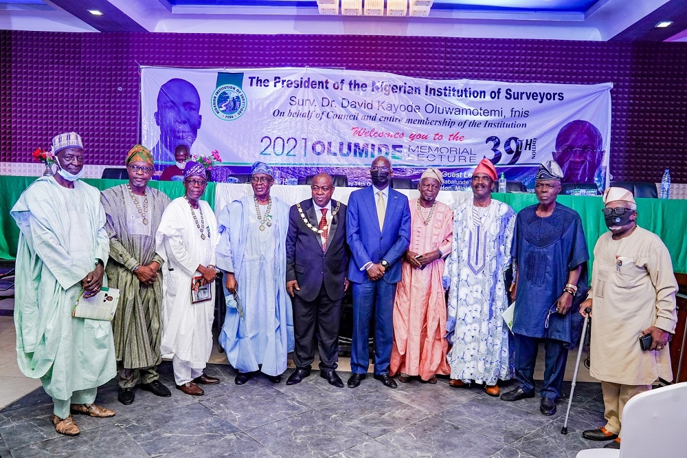 Minister of Works and Housing, Mr Babatunde Fashola, SAN (5th right), President, Nigerian Institution of Surveyors, Surveyor Kayode Oluwamotemi (5th left) and Past Presidents of the Institution in a group photograph shortly after the 39th Annual Olumide Memorial Lecture organized by the Nigerian Institution of Surveyors (NIS) and delivered by the Hon.Minister on the theme, &quot; Human Capital and Institution Building,&quot; at the Chida International Hotel, Utako, Abuja on Thursday 14th October 2021. 