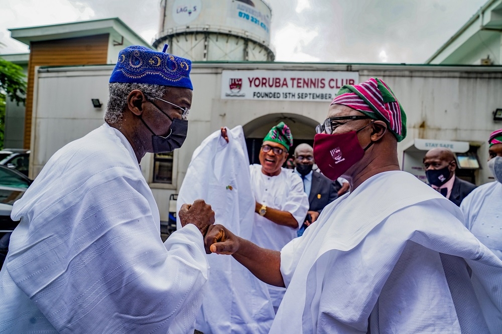 Hon. Minister of Works &amp; Housing and Guest Speaker, Mr Babatunde Fashola, SAN (left) being welcomed by the Chairman, Yoruba Tennis Club, Chief Euzebio Babajide Damazio (right) and Ambassador of Nigeria to the Kingdom of Spain, Chief Ademola Seriki (middle) shortly before the Public Lecture organized by the Yoruba Tennis Club and delivered by the Hon. Minister on the theme,â€ What Can the President Do for Me ?â€ at the Greetings Hall, Yoruba Tennis Club on Friday, 5th November 2021.