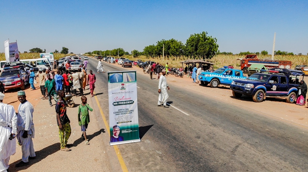 A view of the  Sokoto - Tambuwal -Jega - Kontagora - Makera Road Phase I &amp; II in Sokoto and Kebbi States during its Commissioning and Handover by Representative of the President and Hon. Minister of Justice and Attorney - General of the Federation, Mr Abubakar Malami, SAN ,Hon. Minister of Works and Housing, Mr Babatunde Fashola, SAN,  Governor of Kebbi State, Mr. Abubakar Atiku Bagudu, Chairman, Senate Committee on Works and Senator representing Kebbi Central Senatorial District, Senator Adamu Aliero, Chairman, House  Committee on Works, Hon. Abubakar Kabir Abubakar and others during the commissioning and Handover of Sokoto - Tambuwal -Jega - Kontagora - Makera Road Phase I &amp; II in Sokoto and Kebbi States on Thursday, 25th November 2021 at Koko/Bese LGA, Kebbi State.