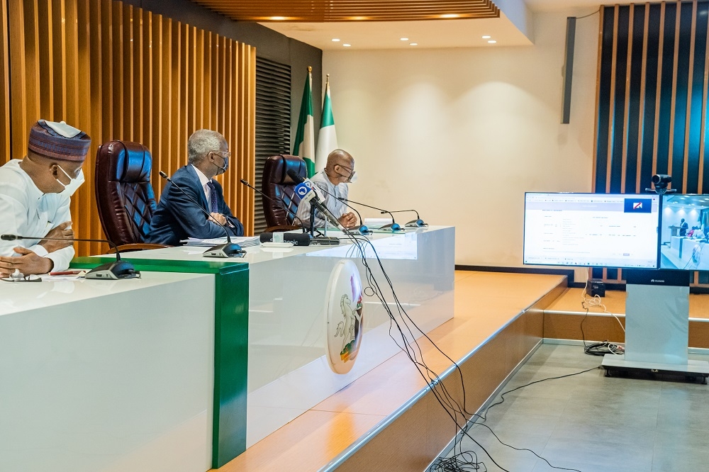 Hon. Minister of Works and Housing, Mr. Babatunde Fashola, SAN(middle),Minister of State in the Ministry of Works and Housing, Mr. Mu&#039;azu Jaji Sambo (left) and Ag.Permanent Secretary, Engr. Chukwunwike Uzo,( right) watch keenly during the HDMI Value-Added Concession (VAC) Request for Proposal (RFP) Virtual Opening of Technical Bid Ceremony at the Ministry of Works and Housing Headquarters, Mabushi, Abuja on Wednesday 23rd February 2022