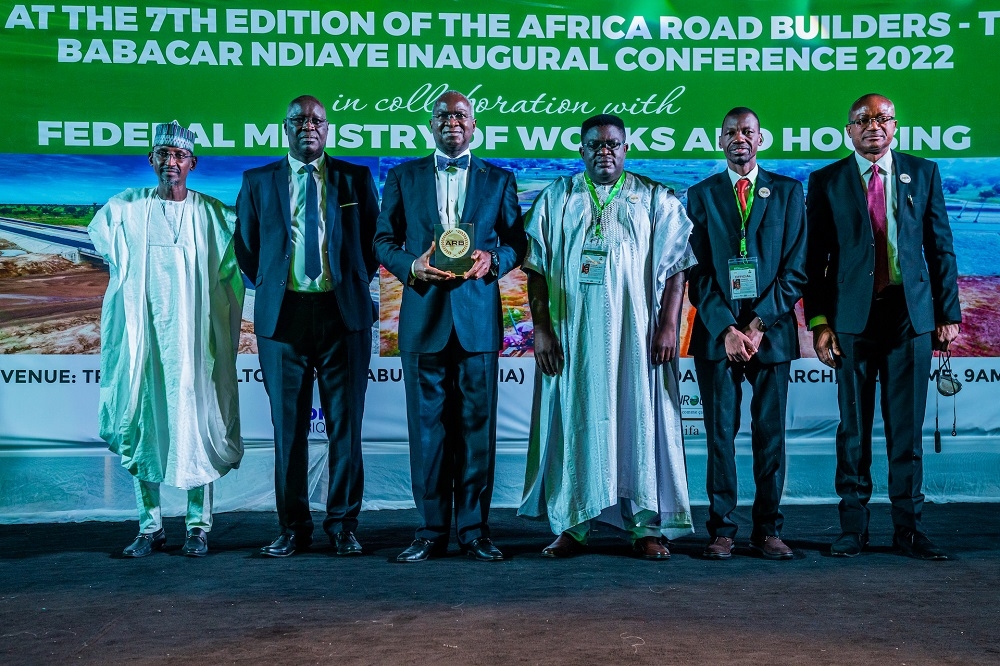 Representative of President Muhammadu Buhari and Hon. Minister of Works and Housing, Mr Babatunde Fashola,SAN (3rd), Minister of Federal Capital Territory (FCT), Muhammad Musa Bello (left), Ag. Permanent Secretary/ Director Highways,Planning and Development, Engr. Chukwunwike Uzo (right), General Commissioner /CEO of ACTUROUTES, Mr. Barthelemy Kouame (2nd right),a former Ambassador from Senegal, Moustapha Dieye (2nd left) and Official Spokesperson , Babacar Ndiaye Awards,Mr George Orido from Kenya (3rd right) in a group photograph shortly after the presentation of the Super Prize Global Trophy to His Excellency, President Muhammadu Buhari through  the Hon.Minister of Works and Housing at the Inaugural Conference Dinner for the 7th Edition of the Africa Road Builders - Trophee Babacar Ndiaye Conference with the theme,&#039; Building Roads, Building Economies&quot;at  the Transcorp Hilton Hotel , Abuja on Thursday 31st March 2022. 