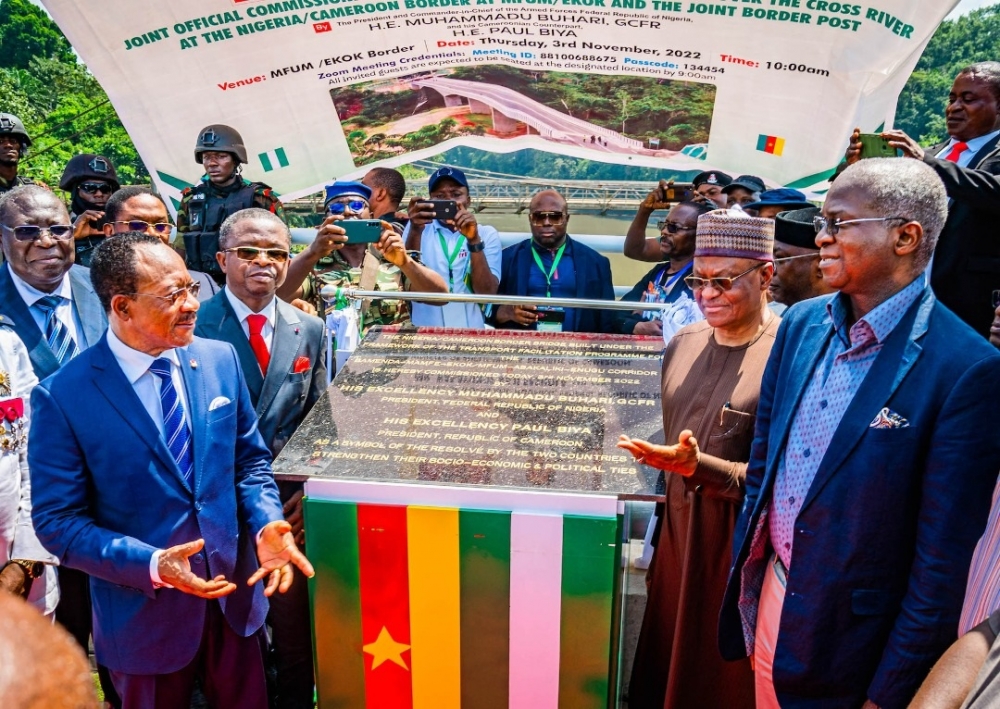 Representative of President Muhammadu Buhari and Hon. Minister of State for Foreign Affairs, H.E Ambassador, Zubairu Dada (2nd right), Representative of President of the Republic of Cameroon, Paul Biya and Minister of Public Works, Mr Emmanuel Nganou Njoumessi (left), Hon. Minister of Works and Housing, Mr Babatunde Fashola, SAN, CON (right) and others during the Joint Commissioning of the newly constructed two-lane Border Bridge over the Cross River at the Nigeria-Cameroon Border at Mfum/Ekok on Thursday, 3rd November 2022