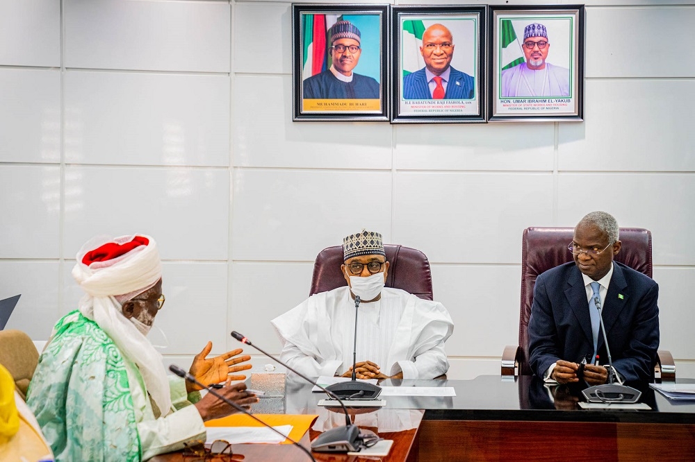 Hon. Minister of Works and Housing, Mr Babatunde Fashola, SAN (right), Hon. Minister of State in the Ministry, Hon. Umar El- Yakub (middle) and Emir of Suleja, Alhaji Mohammed Awwal Ibrahim (left) and during a courtesy and appreciation visit to discuss developmental issues in the Hon. Minister&#039;s Office at the Ministry of Works and Housing Headquarters, Mabushi, Abuja on Tuesday, 8th November 2022.