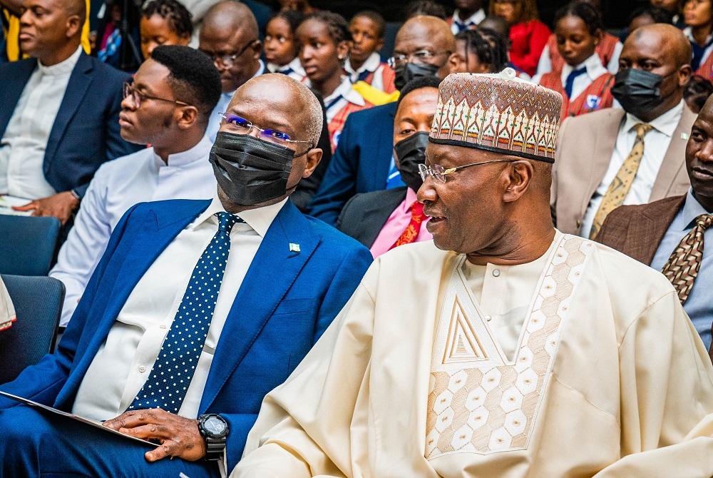 Hon. Minister of Works and Housing and Guest Speaker, Mr Babatunde Fashola, SAN (left) and Secretary to the Government of the Federation and Chairman of the Occasion, Mr Boss Mustapha (right) during the Epiphany Azinge Foundation 2022 Annual Lecture with the theme,&quot; Leadership and Service to Humanity&quot; and public presentation of Biography titled, &quot; Azinge: Born to Serve&quot; at the Shehu Musa Yar&#039;Adua Centre, Abuja on Tuesday, 15th November 2022.