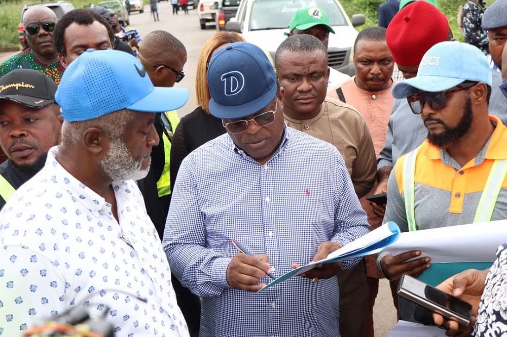 Honourable Minister, Federal Ministry of Works, Senator Dave Umahi and Director, Highways South East, Engr B. U. Obioha  during  inspection of the Rehabilitation of outstanding 2 section of Oba-Nnewi-Arondizuogu-Okigwe Road in Imo/Anambra States