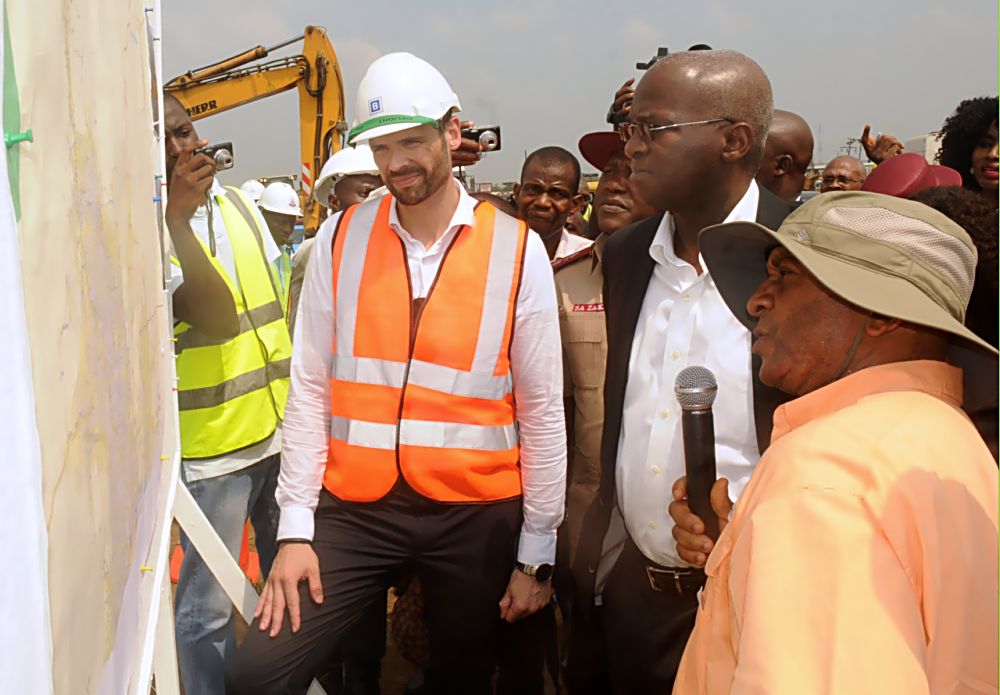 Hon. Minister of Power, Works and Housing, Mr Babatunde Fashola, SAN (middle) being briefed by the Federal Controller of Works Lagos State, Engr. Godwin Eke (right) and Commercial Manager of Julius Berger Nigeria Plc, Mr Hans Meletschus (left) during the Ministerâ€™s  inspection of the completed Phase One of the rehabilitation of the Long Bridge after 40 years of use as part of the reconstruction and rehabilitation of the Lagos-Ibadan Expressway by the Federal Government on Monday 12th December, 2016