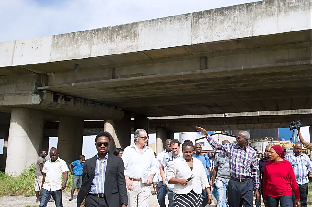 Hon.Minister of Power, Works & Housing, Mr Babatunde Fashola, SAN (2nd right), Acting Federal Controller of Works in Lagos, Engr. (Mrs) Osareme Osakue (2nd left), Director of Borini Prono & Co (Nig.) Limited, Arch. Paolo Prono(left) and Engr. (Mrs) Musiliat Aloba (right) 