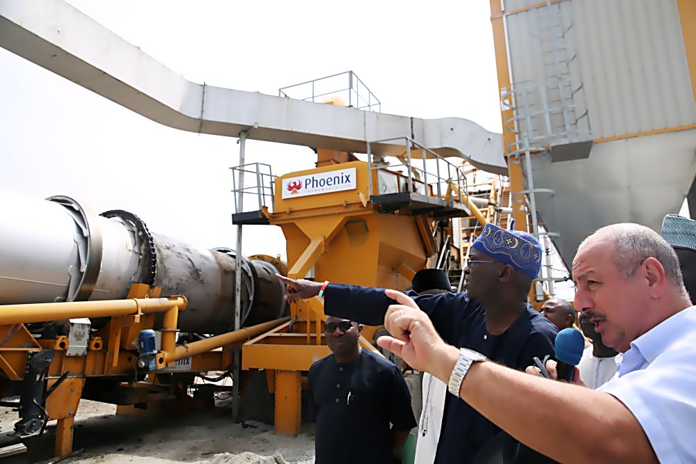 Hon. Minister of Power, Works & Housing, Mr Babatunde Fashola, SAN(left)  being briefed by the Manager Director, Messrs. Triacta Nigeria Limited, Mr Elie Farhat,(right) during the Ministerâ€™s inspection tour of the rehabilitation of Sokoto -Tambuwal road in Sokoto State on Sunday 9th October 2016