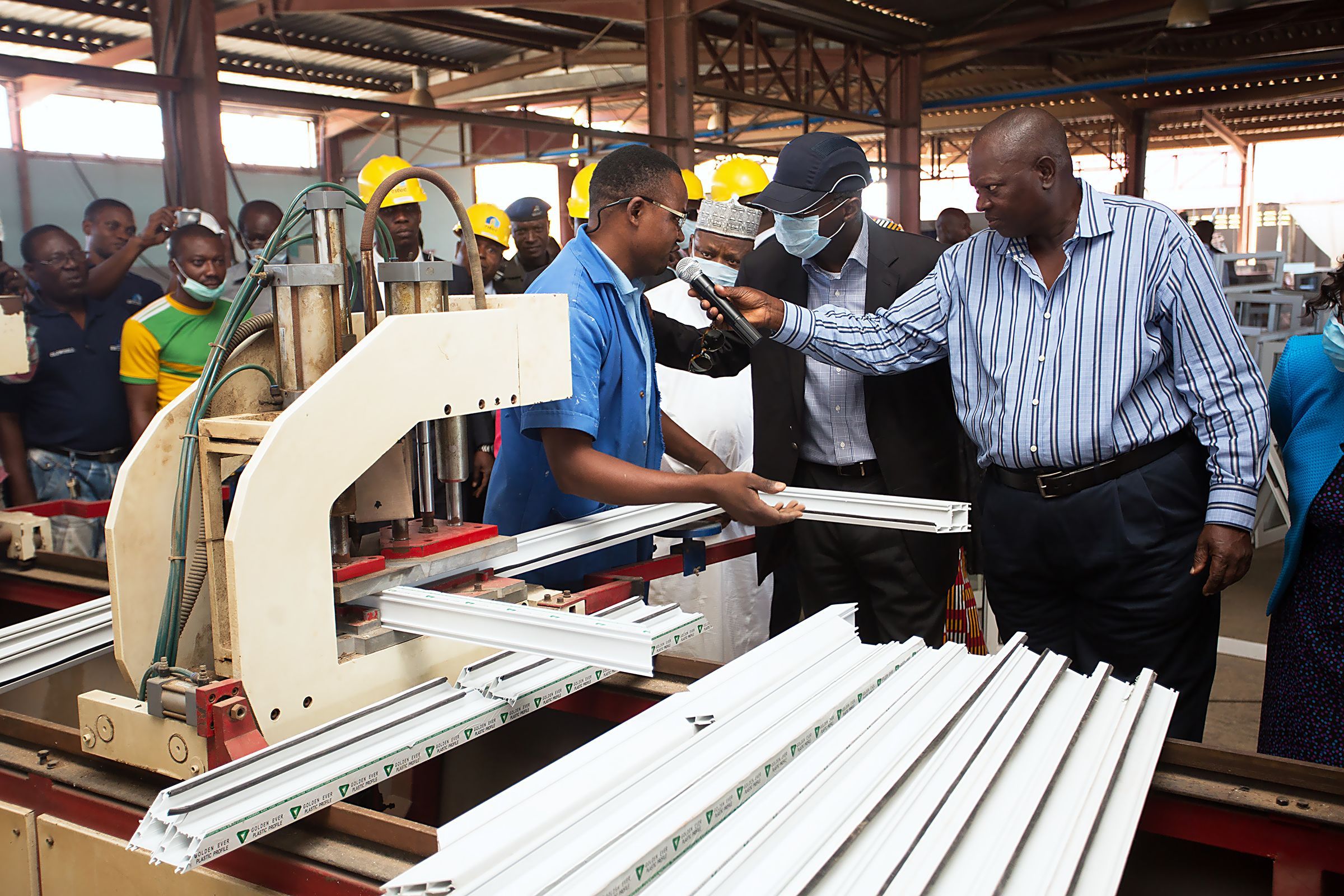 Hon.Minister of Power, Works & Housing, Mr Babatunde Fashola, SAN (left) and MD/CEO, Citec International Estates Limited, Mr Oludare Bello(left) during the Minister's inspection tour of the company's Housing Units,  Polysterene technology and other building material components production facility in Life Camp, Abuja on Thursday 1st December 2016.