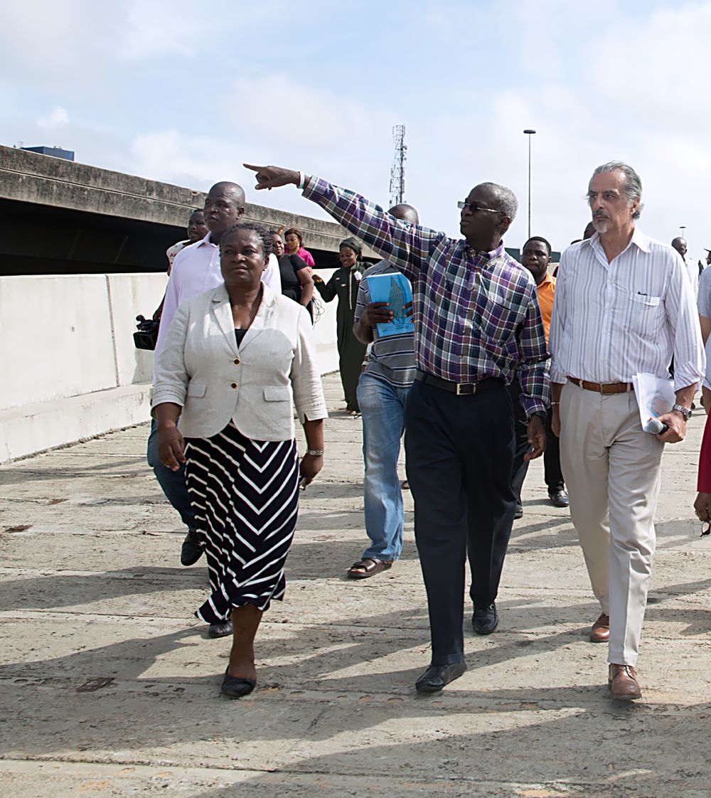 Hon.Minister of Power, Works & Housing, Mr Babatunde Fashola, SAN (middle), Acting Federal Controller of Works in Lagos, Engr. (Mrs) Osareme Osakue (left) and Director of Borini Prono & Co (Nig.) Limited, Arch. Paolo Prono(right)