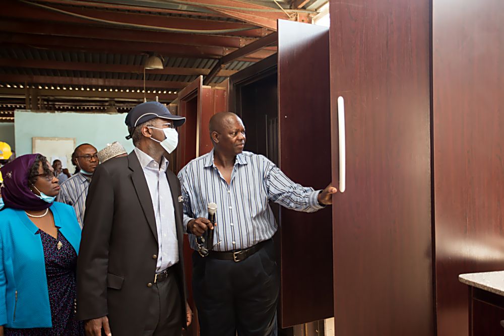 Hon.Minister of Power, Works & Housing, Mr Babatunde Fashola, SAN (middle),Director, Public Private Partnership, Housing Sector in the Ministry, Arch.(Mrs) Eucharia Alozie(left) and MD/CEO, Citec International Estates Limited, Mr Oludare Bello(right) during the Minister's inspection tour of the company using Polysterene technology to produce building material components in Life Camp, Abuja on Thursday 1st December, 2016. 